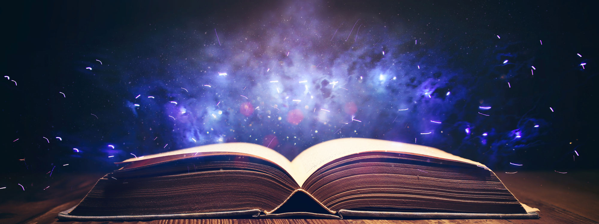 old book with magical sparks shooting out of it